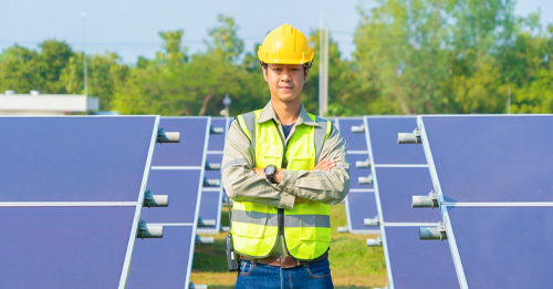 Rooftop solar power system with an inverter installed on a home